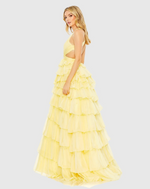 This bold prom dress is styled with a pleated bodice with a deep neckline, waist cutouts, and criss-cross center. Layers of graduated ruffles fill out the full skirt for a design that’s dramatic. Stun at your next prom or formal event in this unique ballgown.

Mac Duggal 67988