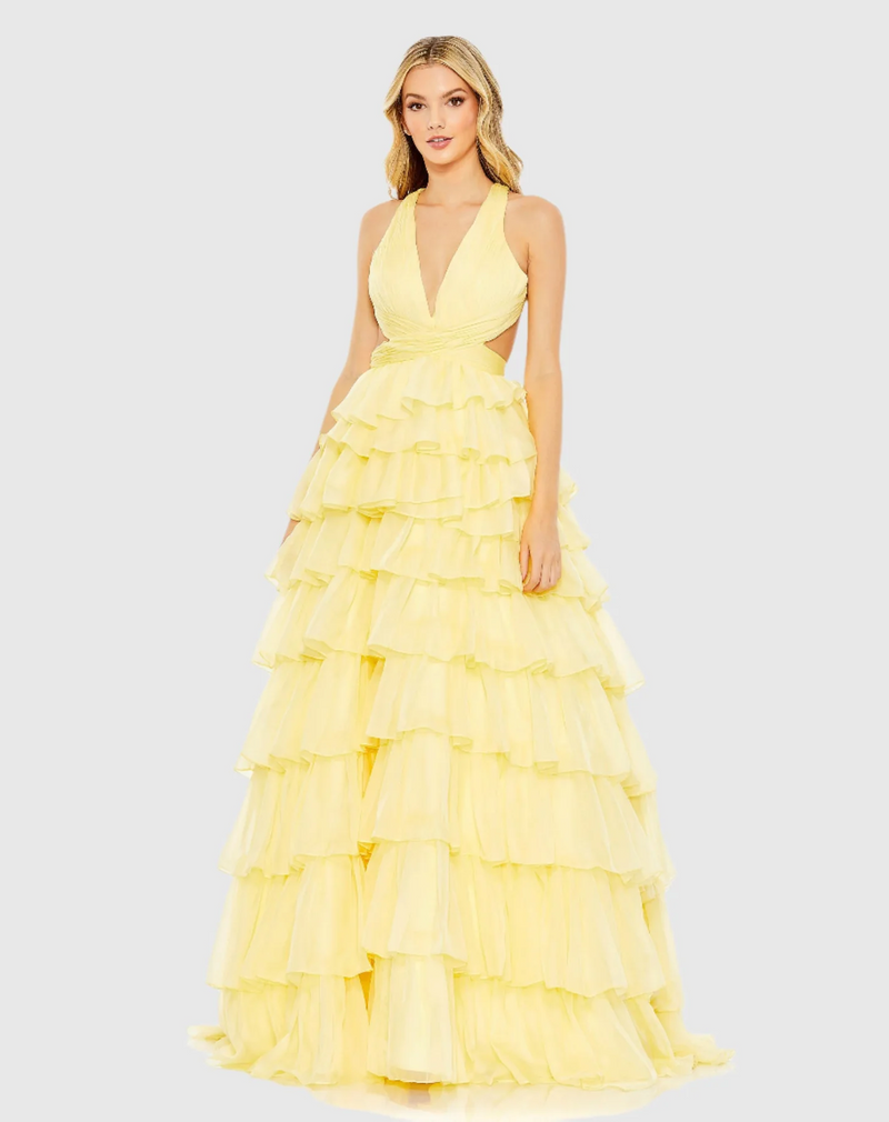 This bold prom dress is styled with a pleated bodice with a deep neckline, waist cutouts, and criss-cross center. Layers of graduated ruffles fill out the full skirt for a design that’s dramatic. Stun at your next prom or formal event in this unique ballgown.

Mac Duggal 67988