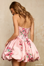 This cocktail dress features a strapless sweetheart neckline with a corset bodice and an A-line bubble skirt with floral fabric. This playful dress is an excellent choice for your next homecoming or formal event.

Sherri Hill 57544