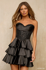 This strapless cocktail dress features a lace corset bodice with a strapless sweetheart neckline and a tiered ruffle skirt. This dress is glamorous and could be perfect for your next homecoming or formal event.

Sherri Hill 57449