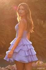 This cocktail dress features a V-neckline with spaghetti straps, a ruffle chiffon A-Line skirt with a taffeta bodice. Style this dress to make it your own at your next homecoming or formal event!

Sherri Hill 57277