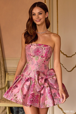 This cocktail dress features a strapless neckline with a drop waistline with a bow detail on the hip, a fit-and-flare silhouette with a brocade fabric. Style this dress to make it your own at your next homecoming or formal event.

Sherri Hill 57468
