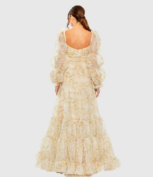 This dress features a floral-printed chiffon fabric that is fully lined through body with long puff sleeves, a pleated bodice and a ruffle tiered skirt. This boho dress could be ideal for your next prom or formal event.

Mac Duggal 68288