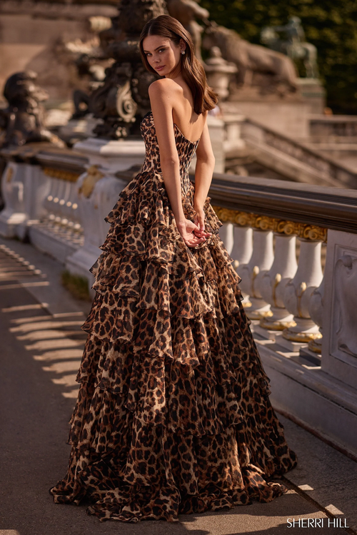 This dress features a strapless sweetheart neckline with cheetah print fabric, a corset bodice and a chiffon ruffle skirt. A stand-out dress for your next prom or formal event.

Sherri Hill 57733