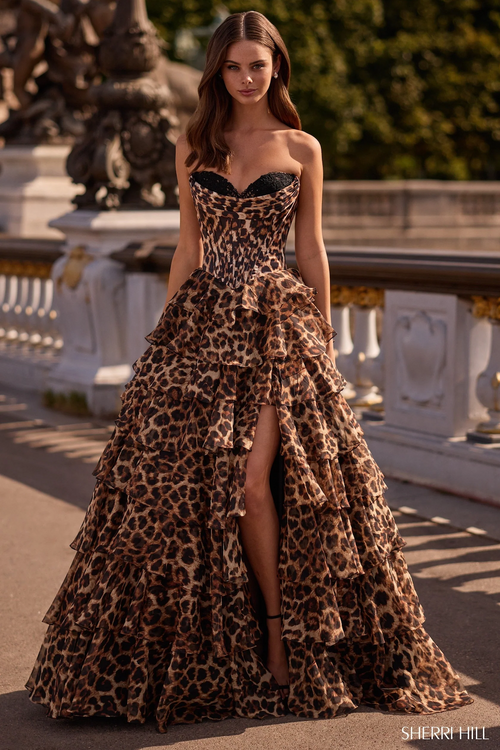 This dress features a strapless sweetheart neckline with cheetah print fabric, a corset bodice and a chiffon ruffle skirt. A stand-out dress for your next prom or formal event.

Sherri Hill 57733