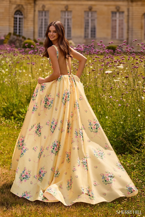 This dress features a square neckline with 1-inch pearl embellished straps, an open back, floral print fabric and an A-line silhouette. Could this be your dream prom dress?

Sherri Hill 57783