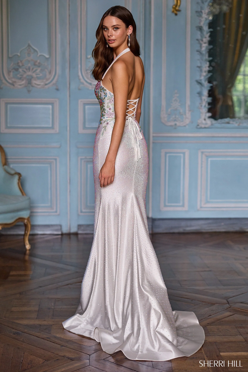 This dress features a halter neckline, a fitted silhouette with hot fix stones and a lace-up back. A stunning choice for your next prom or formal event.

Sherri Hill 57843