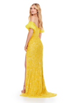 This fully beaded strapless gown features an intricate lace pattern and off-the-shoulder detachable taffeta puff sleeves. The neckline has a sweetheart illusion deep plunge, and the fitted silhouette has a slit in the skirt. Choose this unique design for your next pageant, prom or formal event!  Ashley Lauren 11585