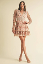 This cocktail dress features delicate floral embroidery with crochet lace trim, long sheer sleeves and a V-neckline. This dress is boho and feminine and could be ideal for your next homecoming or formal event.

EB LD1664