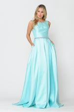 This dress features a high scoop neckline with beaded crystal detailing along the waistline, an A-line silhouette, pockets, and mikado fabric. Style this dress to make it your own at your next prom or formal event.  PY 8678