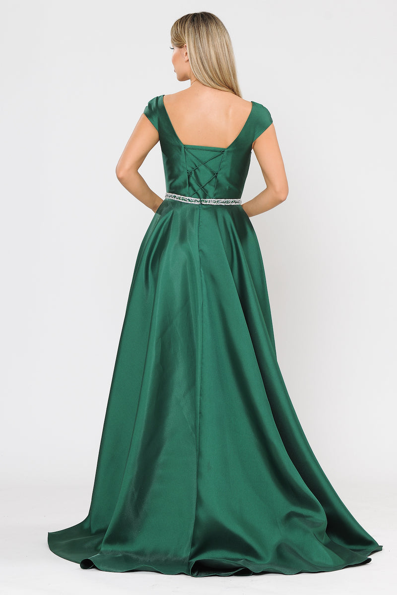 This dress features a sweetheart neckline, a cap sleeve, a lace-up back with an optional panel for more coverage, a rhinestone belt, and an A-line silhouette with mikado fabric and pockets. This dress is a stunning choice if your are looking for a modest dress for your next prom or formal event. Style this gown to make it your own!  PV 8702