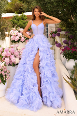 This breathtaking gown showcases glittery tulle and a basque waistline. The tulle skirt is enhanced by delicate gathers, creating an A-line silhouette with a slit. The corset bodice features spaghetti straps, and a sweetheart neckline with a subtle dip, perfectly accentuating your curves. This dress is an enchanting choice for your next prom, pageant or formal event.  AUA 88785