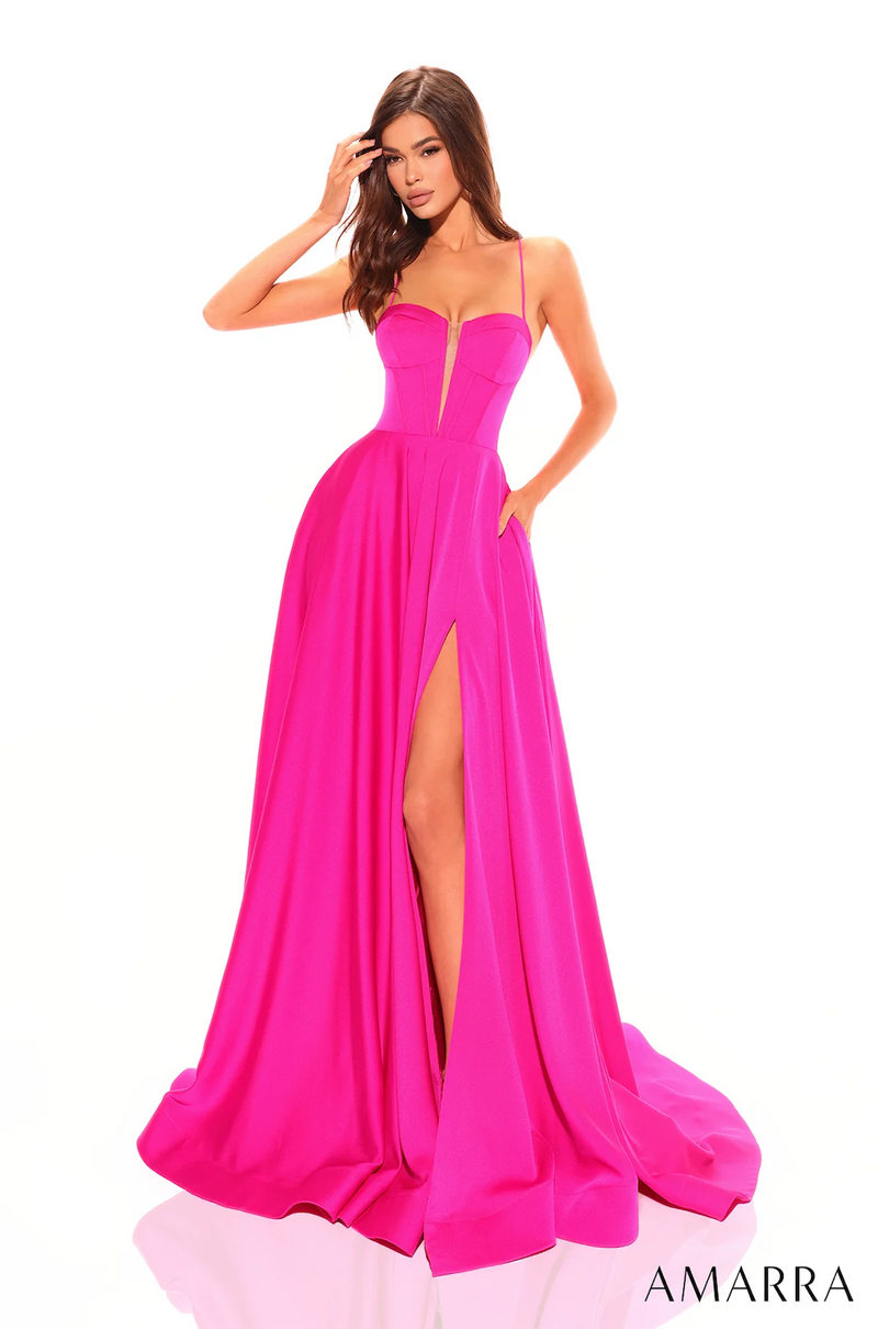 With its precise tailoring, this gown features a fitted bodice adorned with a plunging sweetheart neckline and delicate spaghetti straps. Its ethereal skirt moves flawlessly while intricate strap detailing on the back adds a unique detailing. Choose this effortlessly stunning gown for your next prom, pageant or formal event.  AUA 88801