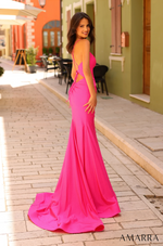 This dress features a v-neckline with spaghetti straps, a bodice with corset boning, a lace-up back with a cutout, a fitted silhouette, stretch shimmer jersey fabric, and a slit with floral and beading applique. This dress has all the details to stun at your next prom or formal event.  AUA 88814