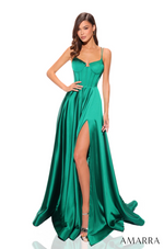 This dress features a scoop neckline, spaghetti straps, a bodice with corset boning, a lace-up back with a cutout, an A-line silhouette with a slit, and satin fabric. This dress has unique details that make it ideal for any prom or formal occasion.  AUA 88850