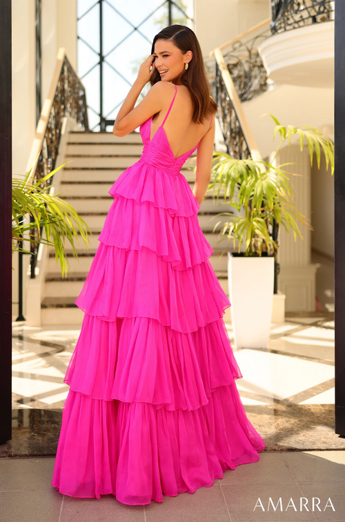 <p><span>Made with layers of premium soft satin and tulle, this dress features a wrapped Basque waistline that shapes your hips as the dress flows into a magnificent A-line silhouette. The V-shaped neck has spaghetti straps with a tiered tulle bottom with a low scoop zipper back. This dress is playful and elegant and could be perfect for your next prom or formal event.</span></p> <p>AUA 88878</p>