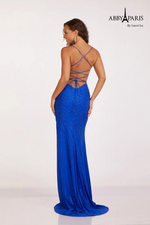 This dress features a v-neckline with spaghetti straps and an open lace-up back. This gown has a fitted silhouette, with hot fix stones intricately laid in a linear pattern that follows the lines of the body and a thigh-high slit. This dress has all the details to make an entrance at your next prom or formal event.  LU 90201
