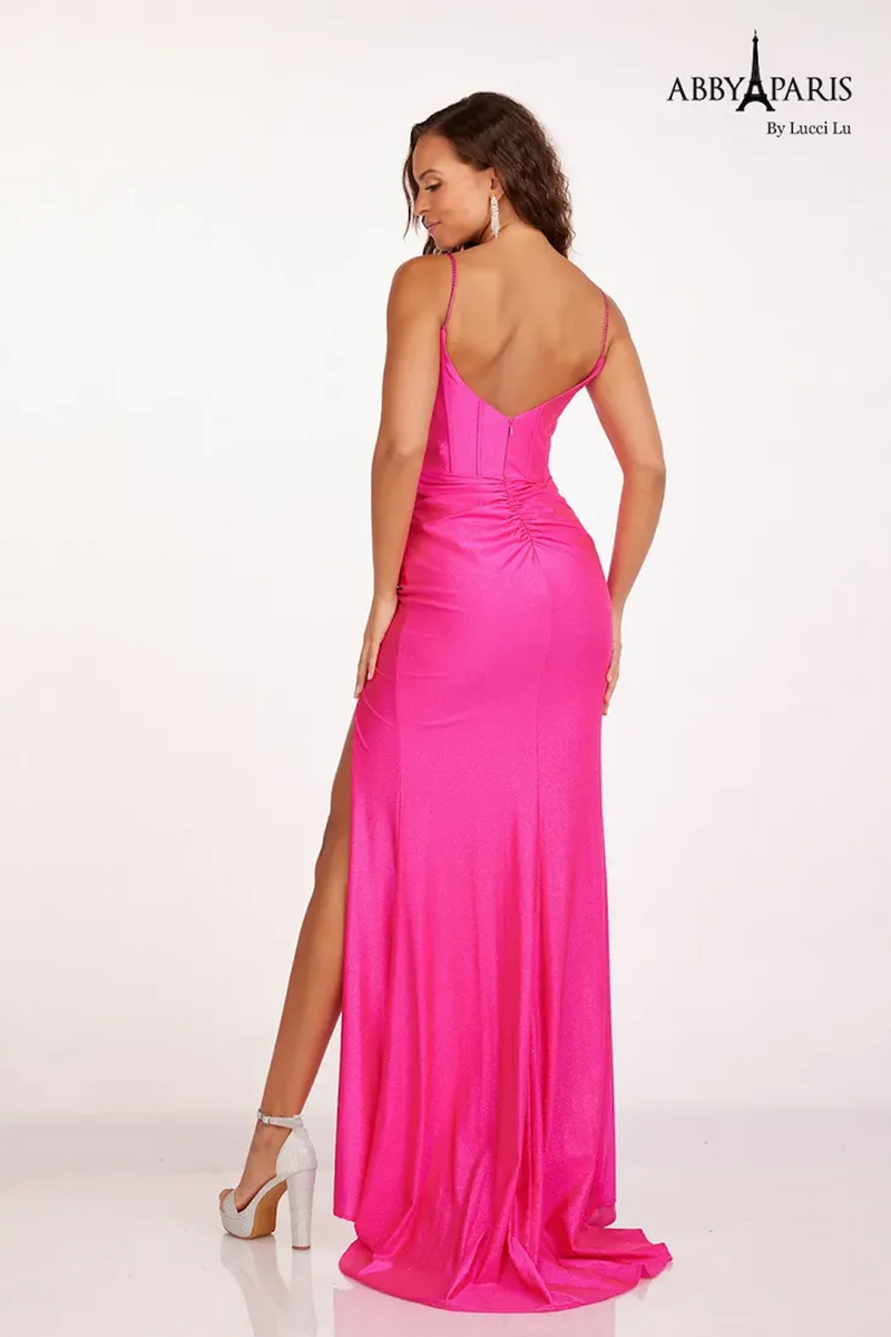 This dress features a bodice with corset boning, spaghetti straps, and a fitted silhouette with a slit. The fabric has a subtle shimmer for that touch of glam. Style this dress to make it your own at your next prom or formal event.   LU 90203