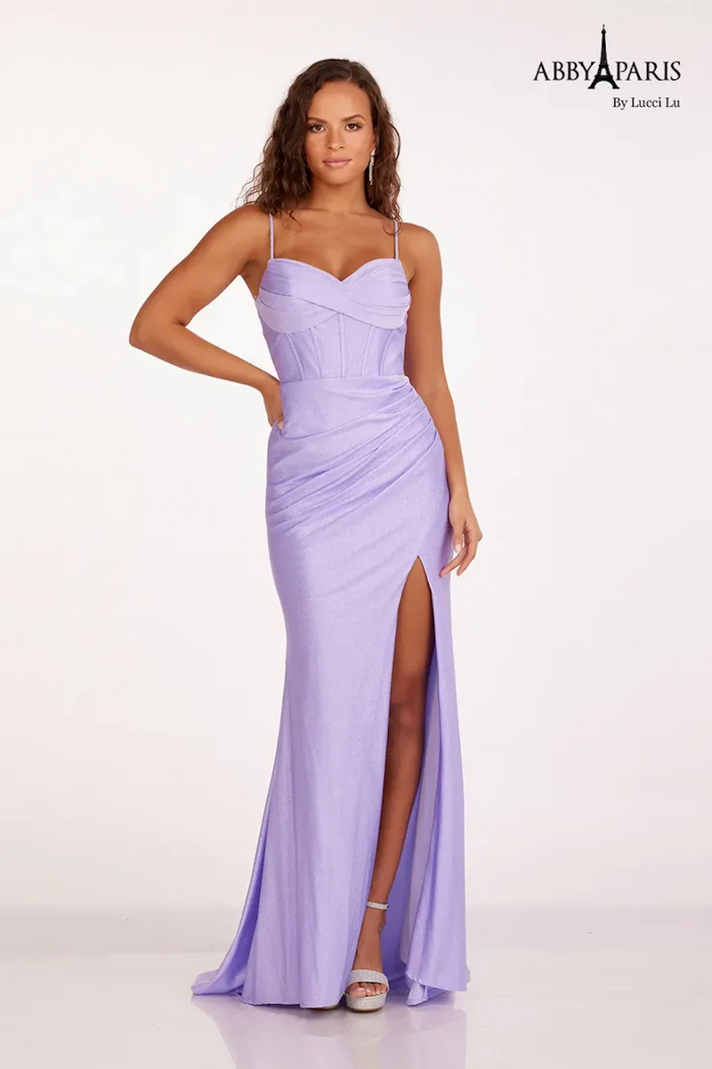 This dress features a bodice with corset boning, spaghetti straps, and a fitted silhouette with a slit. The fabric has a subtle shimmer for that touch of glam. Style this dress to make it your own at your next prom or formal event.   LU 90203
