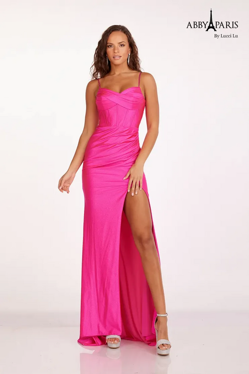 This dress features a bodice with corset boning, spaghetti straps, and a fitted silhouette with a slit. The fabric has a subtle shimmer for that touch of glam. Style this dress to make it your own at your next prom or formal event.   LU 90203