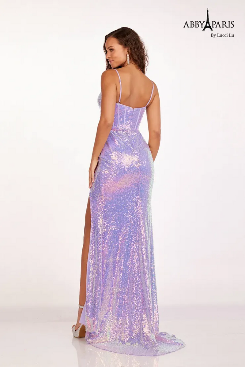 This dress features a corset bodice, with a square neckline and 1-inch straps that taper to adjustable spaghetti straps. The fitted silhouette flatters the figure and the slit offers flexibility of movement. The vibrant sequin fabric is the final detail that makes this dress ideal for your next prom or formal event.  LU 90217