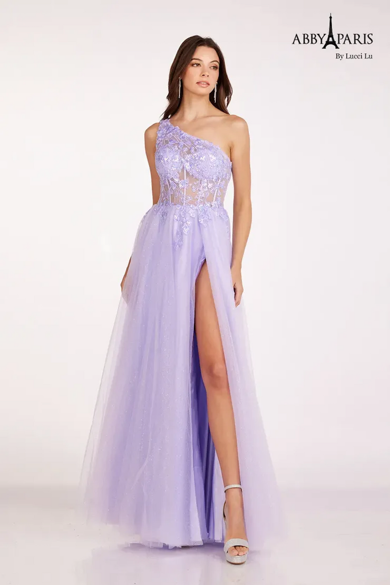 This dress features a one-shoulder neckline, a sheer bodice with corset boning and lace applique, an A-line silhouette with tulle fabric and a slit. This dress is ethereal and romantic and could be just the vibe for your next prom or formal event.   LU 90234