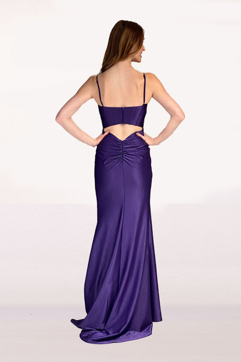 This dress features a deep-v neckline with spaghetti straps and a cut-out in the back. The bodice features corset boning, a fitted silhouette and a slit. This gown is effortless and unique and could be just the vibe for your next prom or formal event.  LU 90264