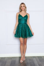 This cocktail dress features a V-neckline with glitter sequined mesh fabric, a circle skirt silhouette, and a captivating corset top detail. With spaghetti straps, convenient pockets, and a lace-up back, this dress combines style and functionality. This dress may be ideal for your next homecoming, sweethearts or formal event.&nbsp;  PY 9192