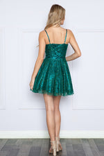This cocktail dress features a V-neckline with glitter sequined mesh fabric, a circle skirt silhouette, and a captivating corset top detail. With spaghetti straps, convenient pockets, and a lace-up back, this dress combines style and functionality. This dress may be ideal for your next homecoming, sweethearts or formal event.&nbsp;  PY 9192