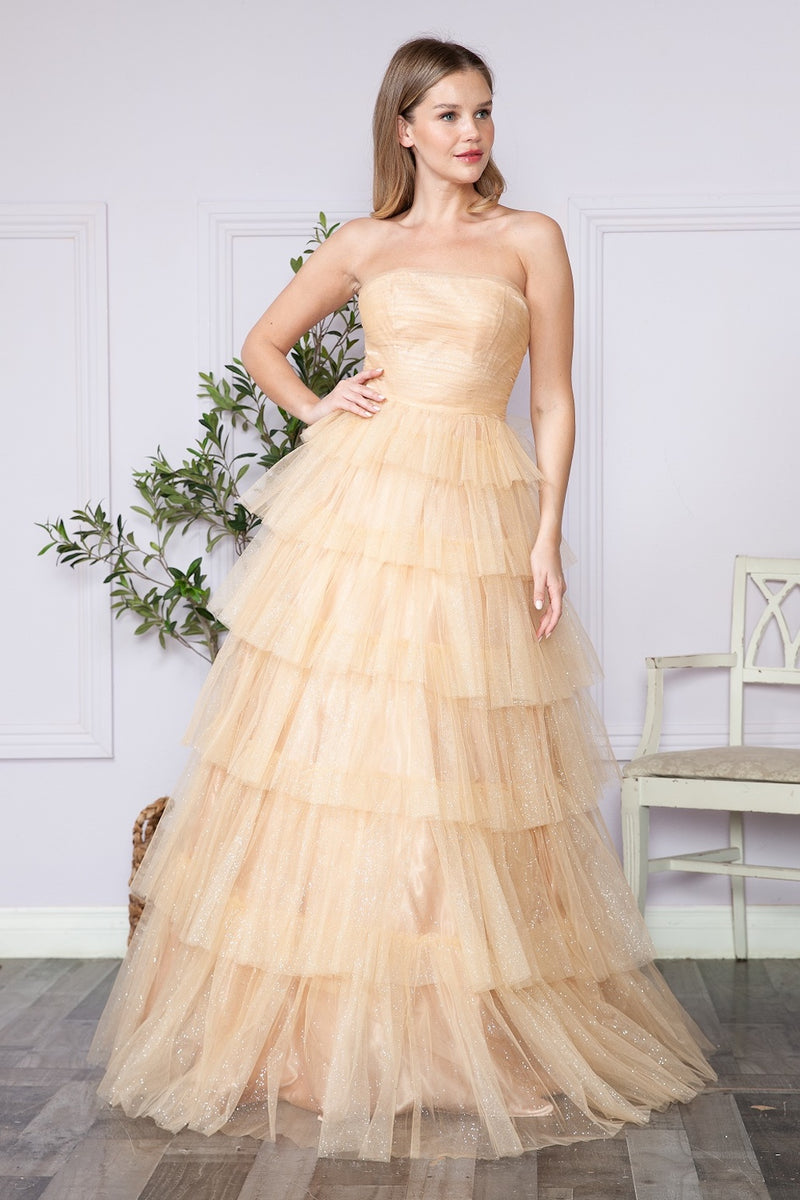 This dress features a ruched bustier, with a multi-tiered, full-length skirt. This enchanting ballgown blends timeless beauty with modern sophistication, perfect for any prom or formal occasion.   PY 9386