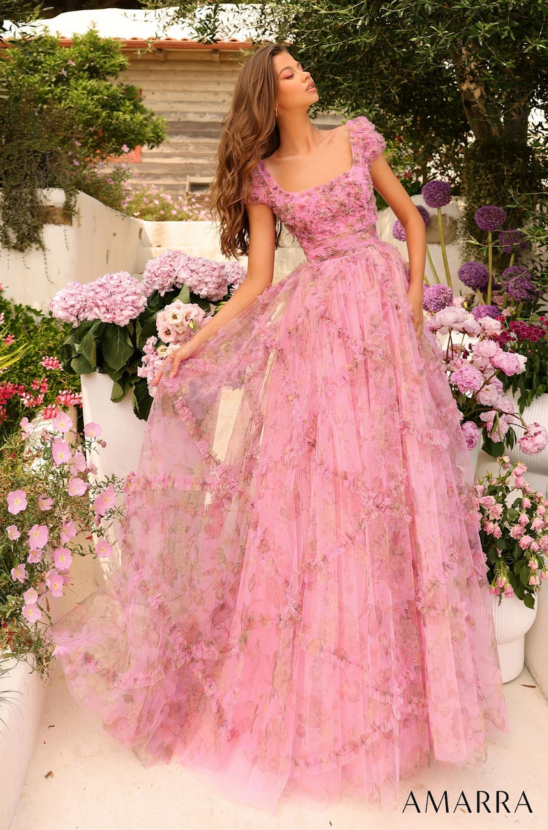 Turn your prom evening into a wondrous fairy tale with our gorgeous long flowery tulle dress with a sabrina neckline, a modest cap sleeve, and a lace-up back. Designed purely out of tulle, the bodice of the dress is filled with flower designs with a fitted waistline and then cascades down to the gathers of the long skirt. If you are looking for extra coverage this dress is a stunning choice.   AUA 94044