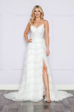 <p>This gown features a v-neckline with a lace bodice and spaghetti straps. The skirt has layered tiered with sequin detailing on each hemline, and a skirt slit. This stunning gown could be perfect for your next prom or formal event.</p> <p>PY 9404</p>