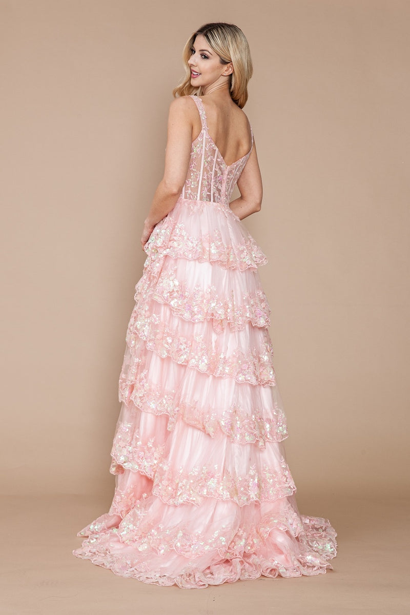 This dress features a lace corset bodice with exposed boning, an A-line silhouette with a ruffle-tiered skirt and slit. This dress is feminine and ethereal and could be just the vibe for your next prom or formal event.  PY 9410