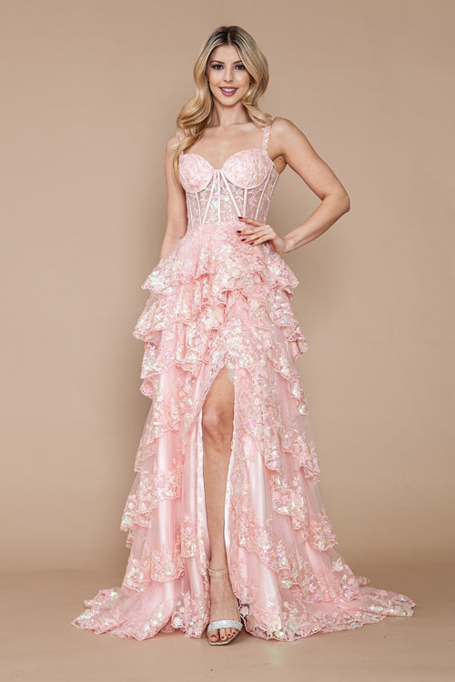 This dress features a lace corset bodice with exposed boning, an A-line silhouette with a ruffle-tiered skirt and slit. This dress is feminine and ethereal and could be just the vibe for your next prom or formal event.  PY 9410