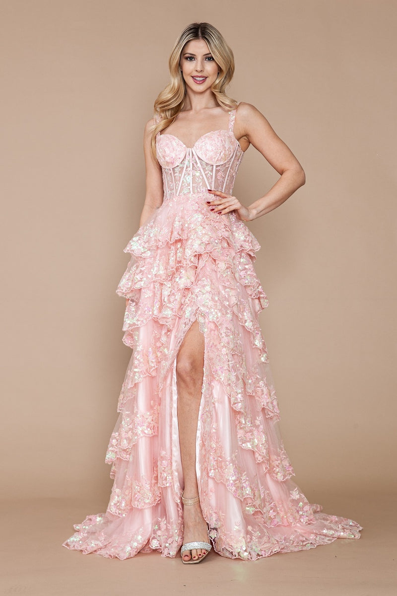 This dress features a lace corset bodice with exposed boning, an A-line silhouette with a ruffle-tiered skirt and slit. This dress is feminine and ethereal and could be just the vibe for your next prom or formal event.  PY 9410