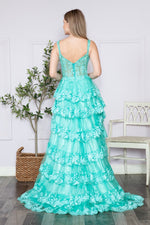 This dress features a lace corset bodice with exposed boning, an A-line silhouette with a ruffle-tiered skirt and slit. This dress is feminine and ethereal and could be just the vibe for your next prom or formal event.  PY 9410