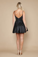 This dress features a sweetheart neckline with spaghetti straps and corset boning in the bodice and rhinestones throughout the fabric. This dress is an ideal choice for your next homecoming or sweethearts dance!

PY 9594