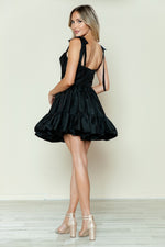 This cocktail dress features taffeta fabric with a ruffle skirt and bow straps. This dress is playful and could be styled to make it your own at your next homecoming or formal event!

PY 9668