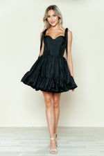 This cocktail dress features taffeta fabric with a ruffle skirt and bow straps. This dress is playful and could be styled to make it your own at your next homecoming or formal event!

PY 9668