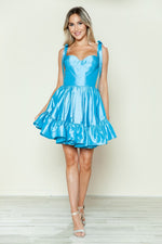This cocktail dress features taffeta fabric with a ruffle skirt and bow straps. This dress is playful and could be styled to make it your own at your next homecoming or formal event!

PY 9668