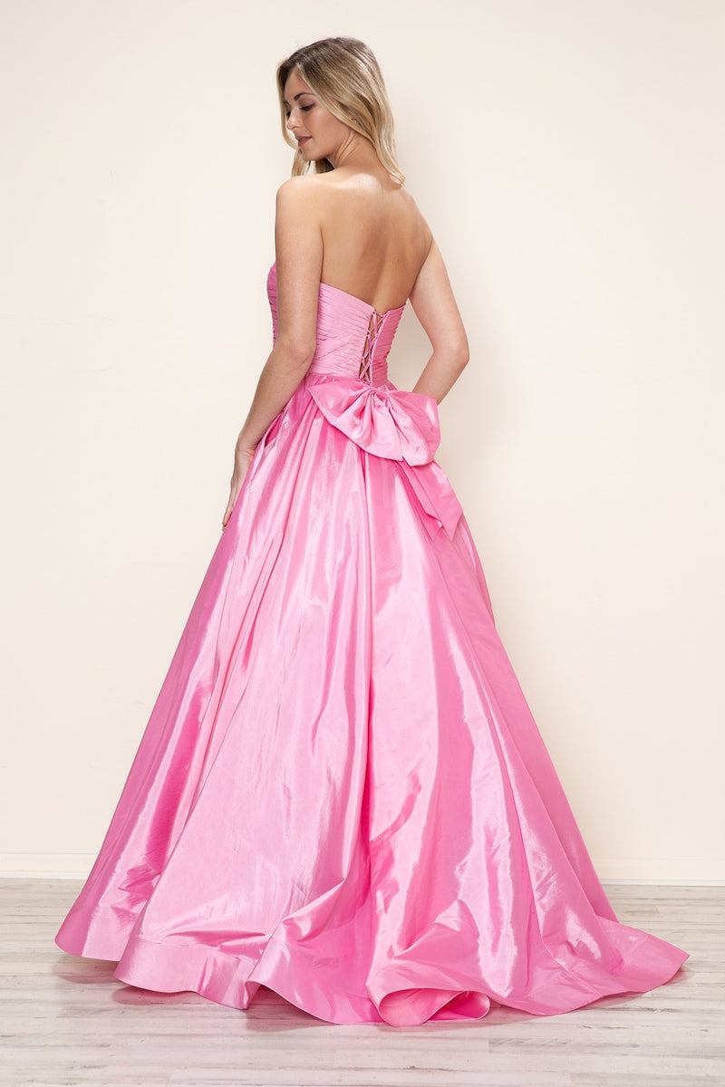 This dress features a strapless neckline with a ruched bodice, a lace-up back with a bow. The taffeta fabric pairs well with the A-line silhouette and pockets for convenience. Style this dress to make it your own at your next prom or formal event.

PY 9754