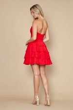 This cocktail dress features a strapless sweetheart neckline with a rosette detail on the bust, and a layered-tiered skirt. This dress is whimsical and romantic and may be just the vibe for your next homecoming or formal event.

PY 9802