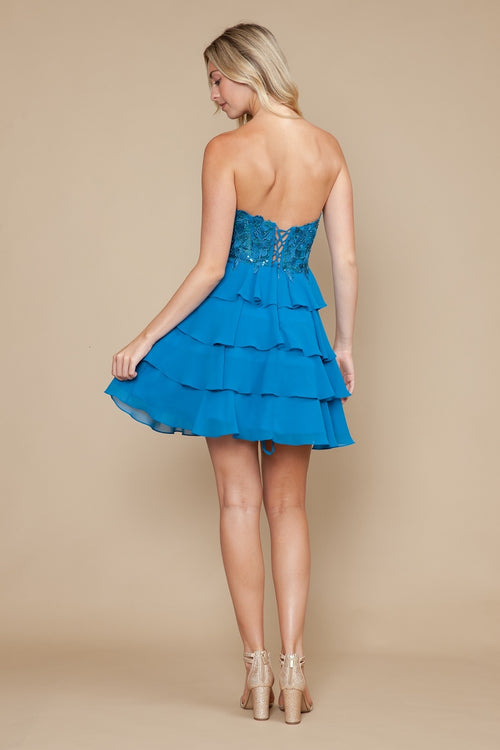 This dress features a strapless neckline with a lace bodice and a lace-up back and a skirt with layered tiers. Style this dress to make it your own at your next homecoming or formal event.

PY 9838