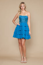 This dress features a strapless neckline with a lace bodice and a lace-up back and a skirt with layered tiers. Style this dress to make it your own at your next homecoming or formal event.

PY 9838