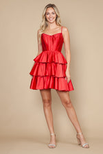 This dress features a straight across neckline with spaghetti straps and a lace-up back. The skirt has tiered layers that create an A-line silhouette. This dress is playful and could be styled to make it your own at your next homecoming or formal event.

PY 9896