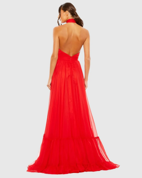 This dress features chiffon fabric, a halter neckline with an open back, an organza flower detail on neck and a tiered skirt. This elegant gown could be ideal for your next prom or formal event.

Mac Duggal A68209