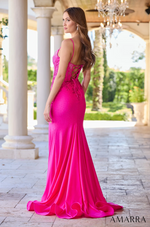 This dress features spaghetti straps and a lace-up back with a rhinestone bodice that grabs attention with its deep sheer V-neckline, and well-placed paneling that gives this dress structure and support. The fitted silhouette and slit complete the design for this stunning gown, perfect for your next prom or formal event.  AUA 88670