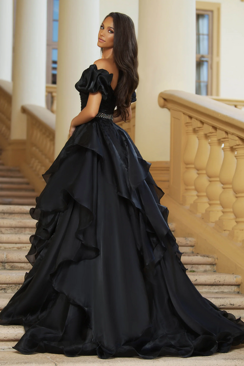 The Taya dress is for the fashionista dreaming of a night on the town! Off the shoulder ruffle sleeves pair perfectly with a ruffle ballgown featuring a beaded waistline, perfect for getting your Cinderella on! You'll be feeling fab and dancing the night away!  ARY&nbsp;28571