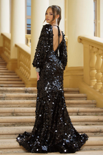 This dress features a fitted silhouette with large-format sequins. The high neckline pairs beautifully with the open back and long sleeves with bejeweled cuffs. The skirt slit and train make this dress a show-stopper, perfect for your next pageant or formal event!  ARY 39256