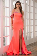 This dress features a one-shoulder neckline that falls off the shoulder with a bow detail embellished with crystal beading. The fitted silhouette has a slight train with a slit in the skirt. This dress is elegant and gives red carpet-vibes. This could be just the look for your next prom, pageant or formal event.  ARY 39304